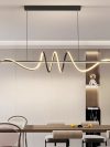 Dining room chandelier simple modern minimalist dining room table lamp 2024 new shaped eye protection long net red bar light